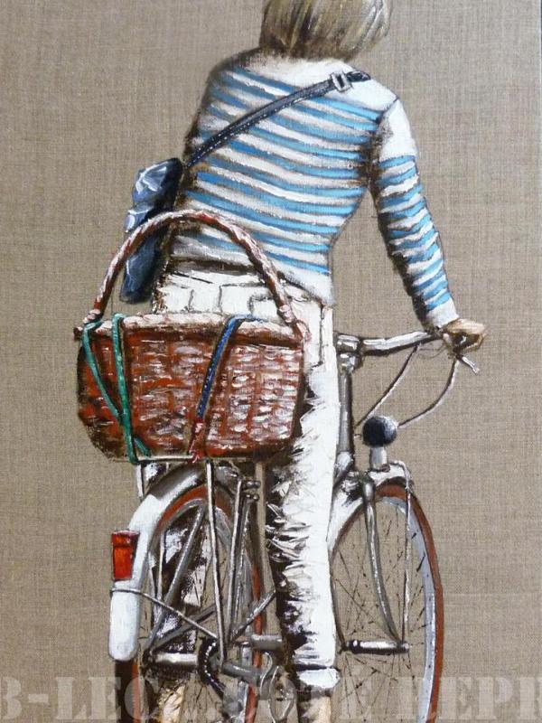 Femme en vélo